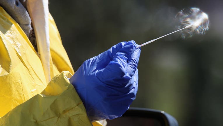 A close-up view of a swab used by medical workers to administer the coronavirus test at the drive-in center at ProHealth Care on March 21, 2020 in Jericho, New York. 
