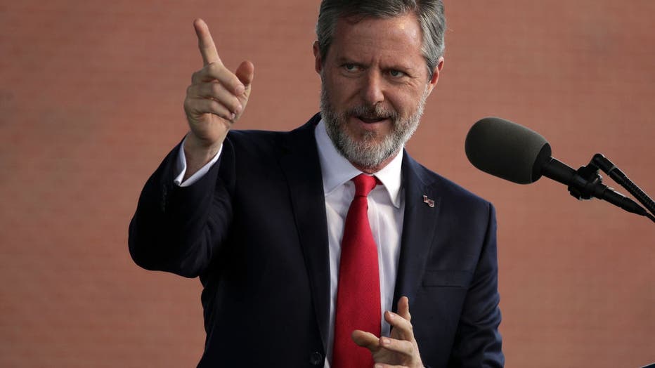 FILE - Jerry Falwell Jr., President of Liberty University, speaks during a commencement at Liberty University May 13, 2017 in Lynchburg, Virginia.