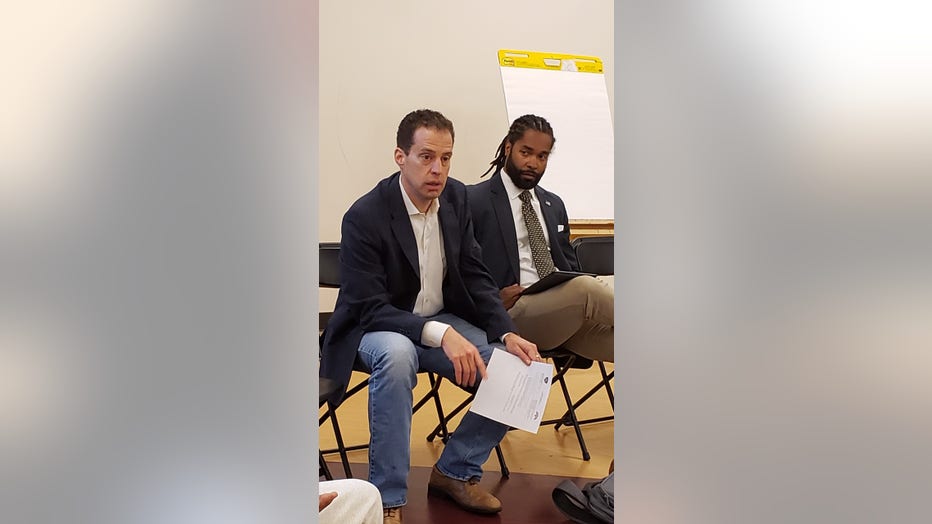 John Alden (left) and police commissioner Henry Gage listen to youth talk about interactions with Oakland police. Feb. 29, 2020