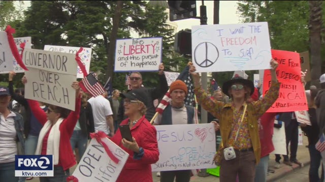 California protesters push to reopen; governor urges caution
