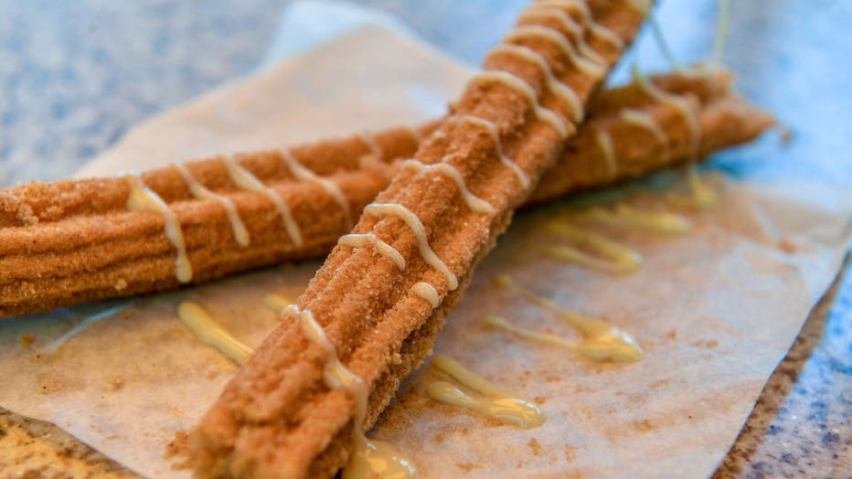 FILE - Horchata churro drizzled with condensed milk at California Adventure in Anaheim, California, on Sept. 13, 2019.