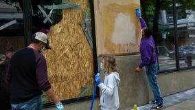 Volunteers across the US gather to clean up debris, trash and graffiti after protests