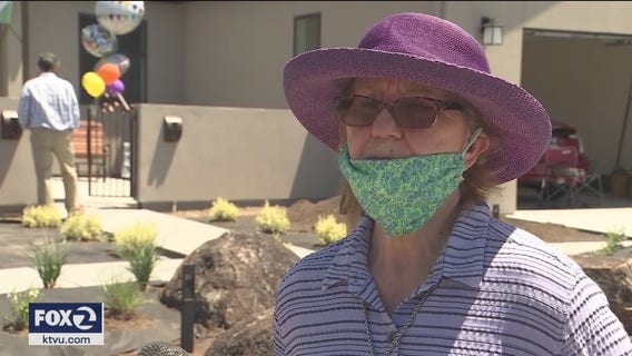 Social-distance housewarming party for 86-year-old fire survivor allowed back home