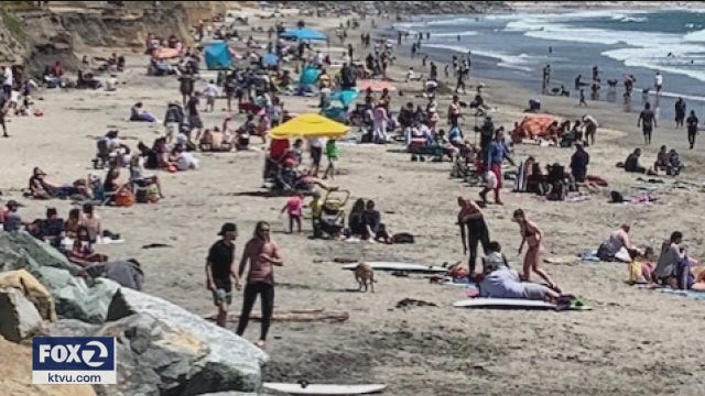 Crowds defy COVID-19 social distancing guidelines Memorial Day weekend