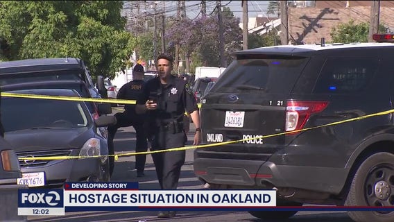 Oakland man barricaded in home with young children and rifle peacefully surrenders