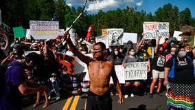 Trump plans fiery Rushmore rally amid virus threat, protesters