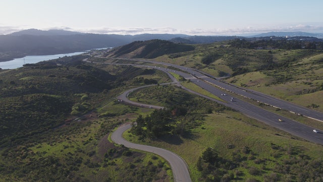 Minor injuries reported after vehicle crashes down embankment off I-280 in Woodside