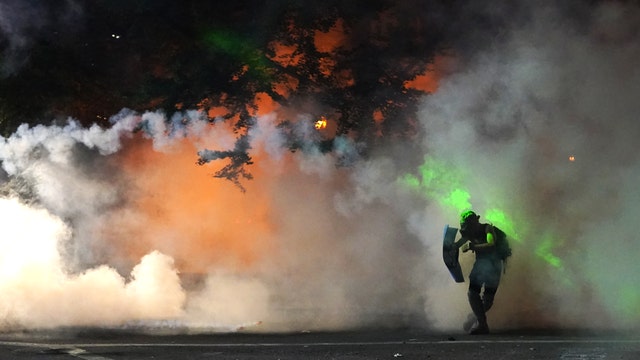 Oregon urges judge to rein in US agents deployed in Portland