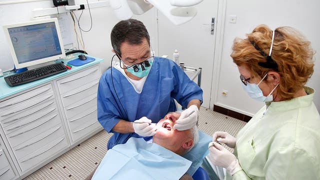 Put off routine dental visits until virus risk slows, WHO says