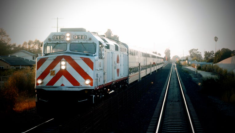 Caltrain Locomotive 918 heads south in San Mateo