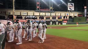 A's, Astros walk off field in protest, game postponed