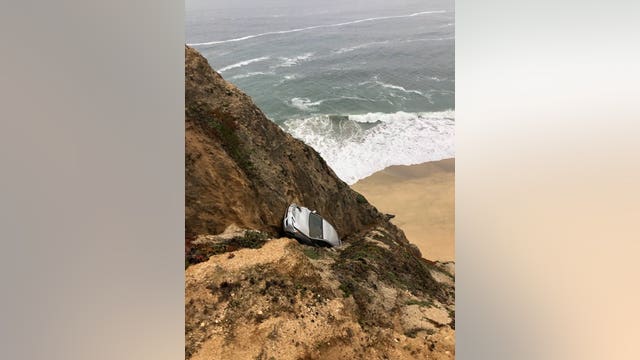 Woman killed when car plunges from huge Highway 1 cliff