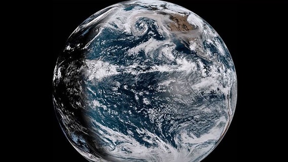 Satellite video shows smoke from West Coast wildfires being pulled into Pacific cyclone