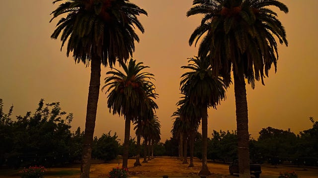 California fire that killed 3 threatens thousands of homes