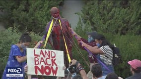 Protestors use rocks to chip away at Junipero Serra statue in San Rafael