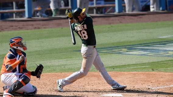 Pinder’s HR helps rally A’s past Astros 9-7, trail ALDS 2-1