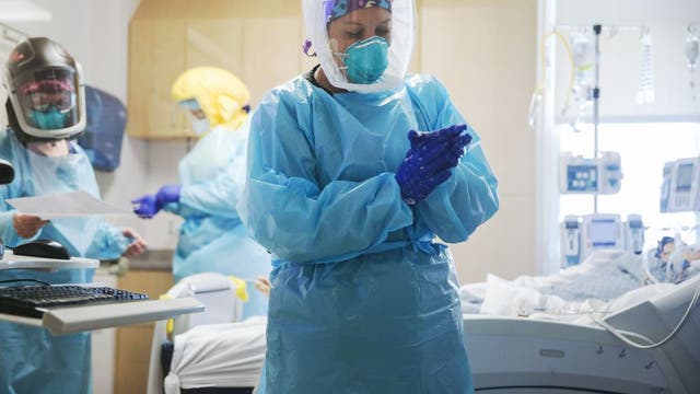 California reports a record 585 virus deaths in single day