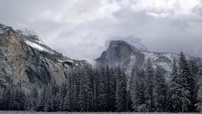 Snow blankets Yosemite National Park, helping to 'mellow fire behavior' in area