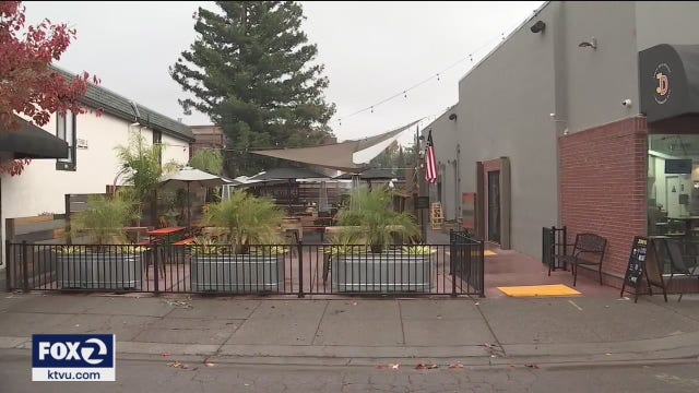 Wet weather and outdoor dining don't mix; rain coincides with stricter virus rules