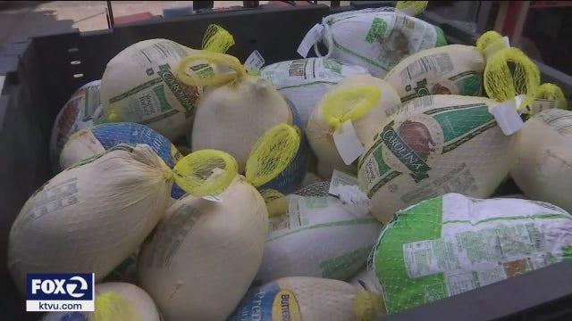 Sacred Heart's Thanksgiving food distribution faces challenges with increased demand, fewer volunteers