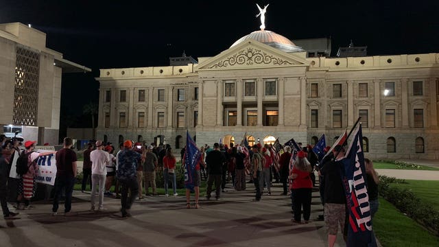 Trump backers converge on vote centers in Michigan, Arizona