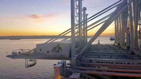 Ship containing massive container cranes headed for Port of Oakland to dock at Drakes Bay
