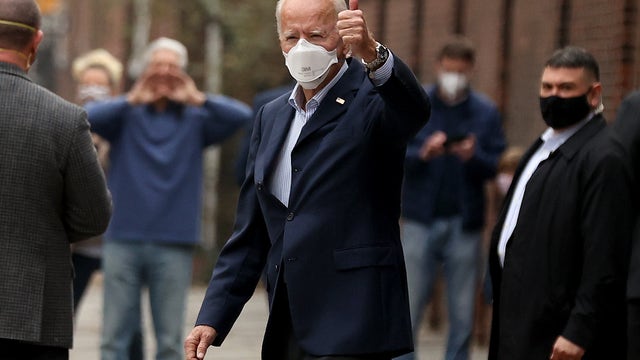 'Democracy prevailed': Biden aims to unify divided nation