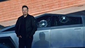 Tesla posts 1st annual profit but misses analysts' estimates