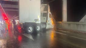 Jack-knifed big rig blocking two lanes of Bay Bridge by Treasure Island