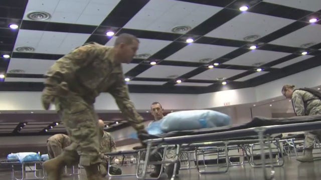 Coroner, National Guard to help with COVID-19 bodies as death toll rises