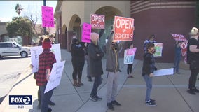 Oakley parents hold protest to reopen schools after viral hot mic moment