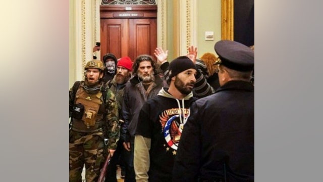 Filing: Proud Boys member seen smashing windows during Capitol Riot considering guilty plea