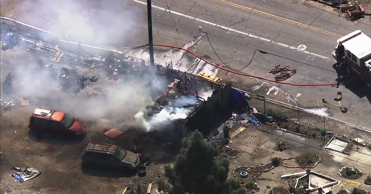Oakland firefighters battle encampment blaze near Home Depot store ...
