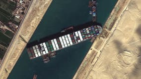 No timeline given for extracting wedged container ship from Suez Canal