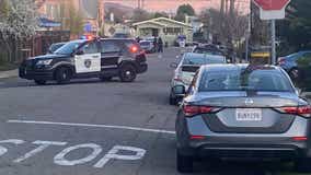 Two Oakland police officers injured after being struck by a  car