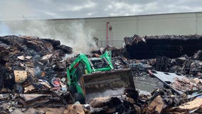 Friday night fire at Oakland recycling facility originated at homeless encampment, officials say