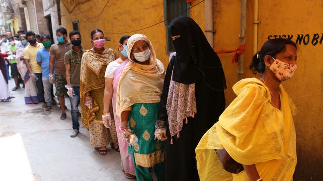 India sets another global daily record of 379K new COVID-19 cases as lines of ambulances wait at crematoriums