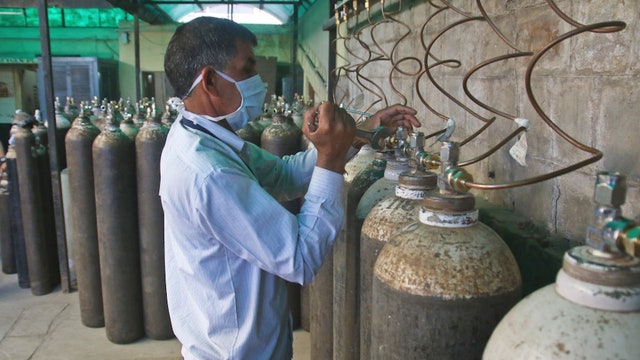 India tops 200,000 dead as virus surge breaks health system