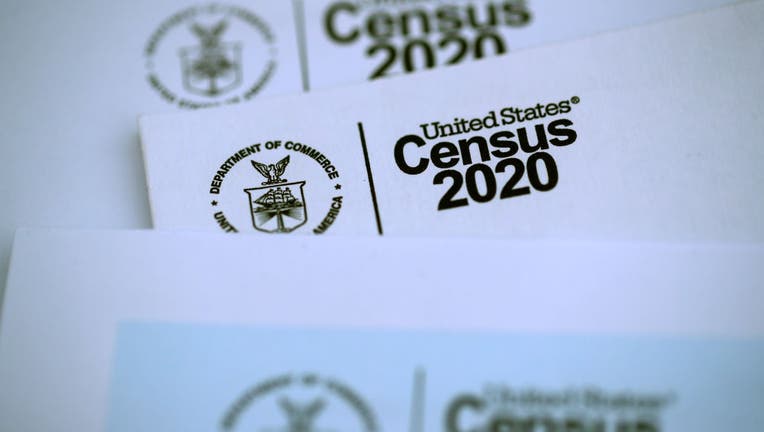 FILE - The U.S. Census logo appears on census materials received in the mail with an invitation to fill out census information online on March 19, 2020 in San Anselmo, California. (Photo Illustration by Justin Sullivan/Getty Images)