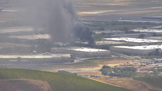 Firefighters working to contain blaze at commercial building near Napa County Airport