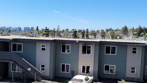 Oakland Fire Department contains 2-alarm blaze at apartment building