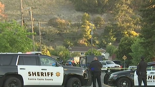 Armed man in Pinole surrenders to police; dog fatally shot