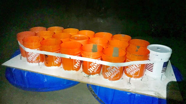 2 students rescued after homemade boat made of duct tape, buckets, kiddie pools drifts too far