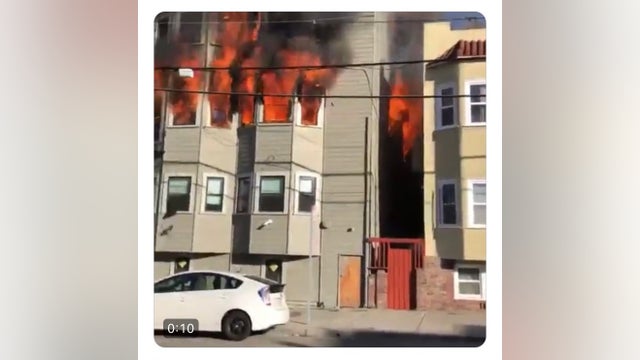 Flames shoot out from windows from Oakland apartment building near Lake Merritt