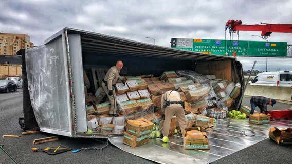 Overturned box truck carrying lettuce blocks lanes on I-80 near the MacArthur Maze