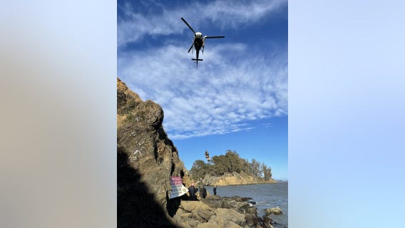 Robbery suspect attempts to elude capture by swimming in Bay