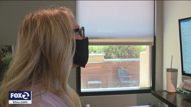 Most vaccinated California workers must keep masks on