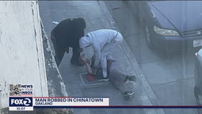 Two suspects seen on video beating, robbing victim in Oakland's Chinatown