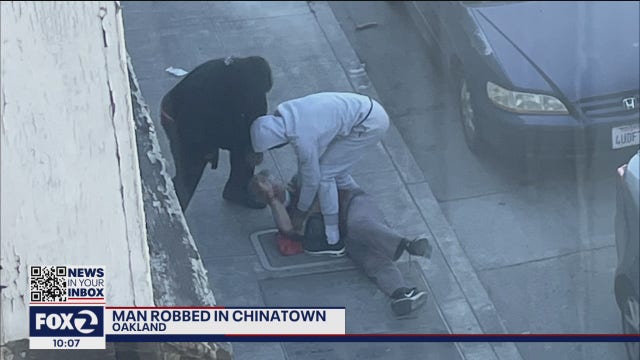 Two suspects seen on video beating, robbing victim in Oakland's Chinatown