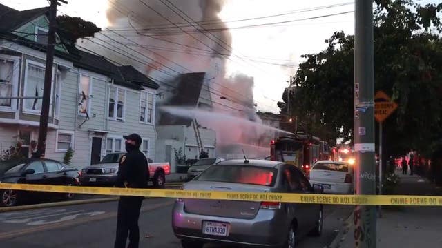 Fire starts at vacant West Oakland home, spreads and displaces eight people